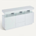 **Moderne witte kast met glazen elementen en lades**